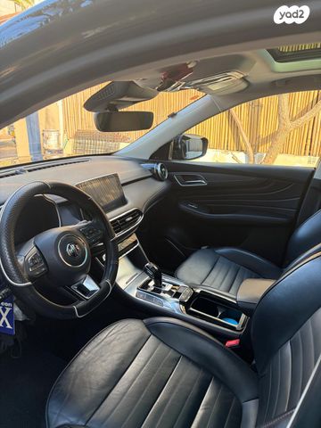 מודעת רכב אם ג'י EHS PHEV