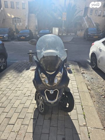 מודעת רכב פיאג'ו MP3 500