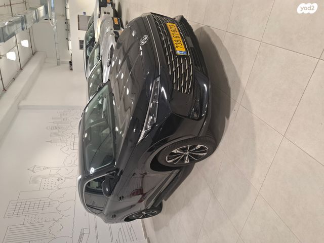 מודעת רכב אם ג'י EHS PHEV