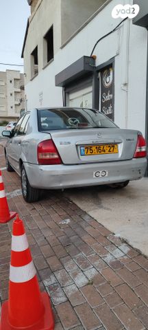 מודעת רכב מאזדה 323