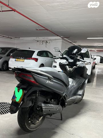 מודעת רכב קימקו איקס-טאון 125I