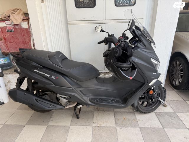 סאן יאנג ג'וי-מקס 300 XI