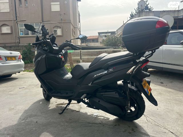 מודעת רכב סאן יאנג ג'וי-מקס Z-300