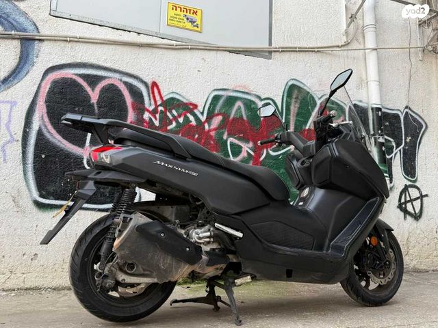 סאן יאנג מקסים 400i