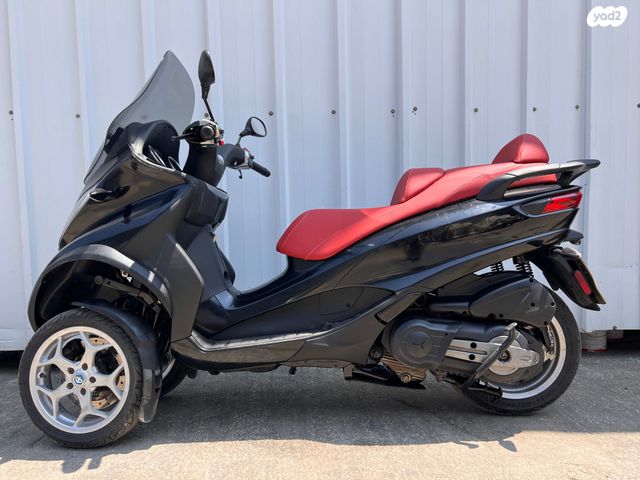 מודעת רכב פיאג'ו MP3 500