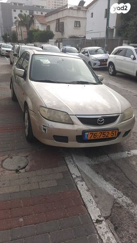 מודעת רכב מאזדה 323