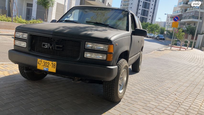 מודעת רכב ג'י.אם.סי יוקון