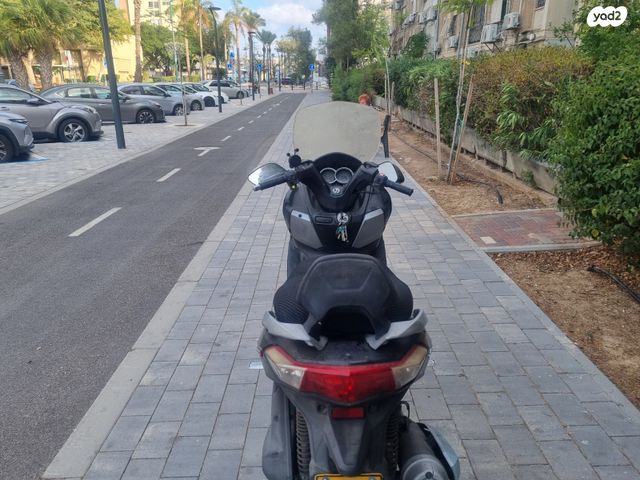 מודעת רכב סאן יאנג ג'וי-מקס 125