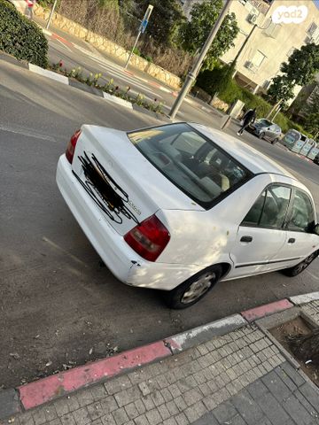 מודעת רכב מאזדה 323