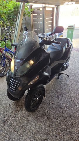 מודעת רכב פיאג'ו MP3 400