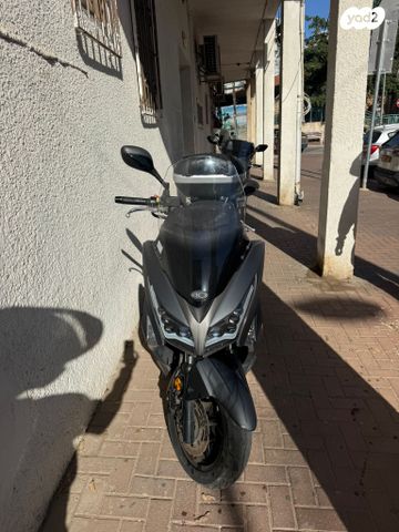 מודעת רכב קימקו איקס-טאון 125I