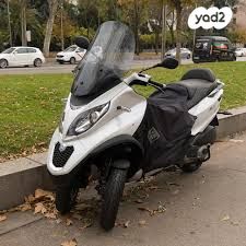 מודעת רכב פיאג'ו MP3 500