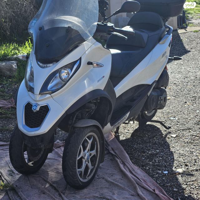 מודעת רכב פיאג'ו MP3 500