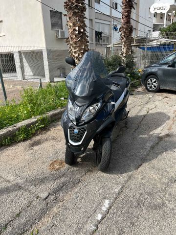 מודעת רכב פיאג'ו MP3 400