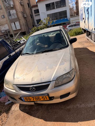 מודעת רכב מאזדה 323