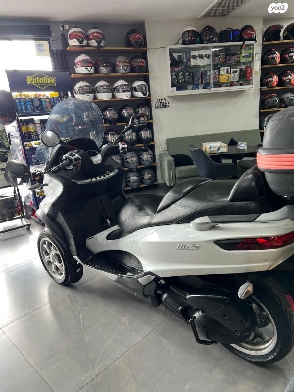 מודעת רכב פיאג'ו MP3 300