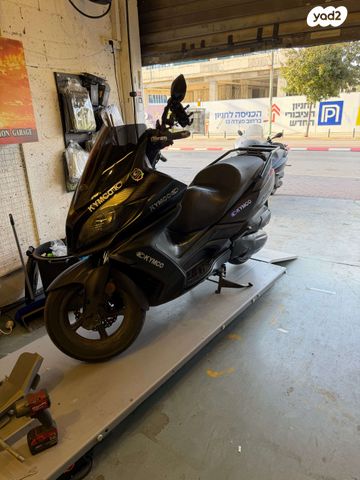 מודעת רכב קימקו דאון-טאון 350