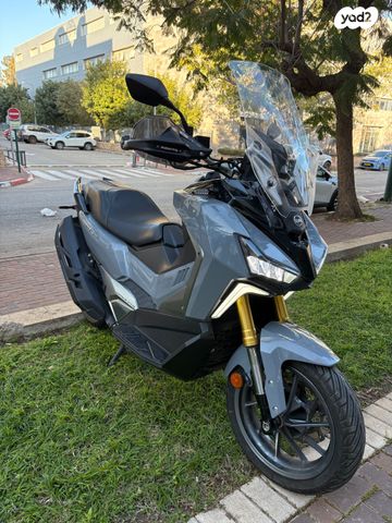 מודעת רכב סאן יאנג ADX400