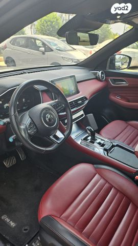 מודעת רכב אם ג'י EHS PHEV