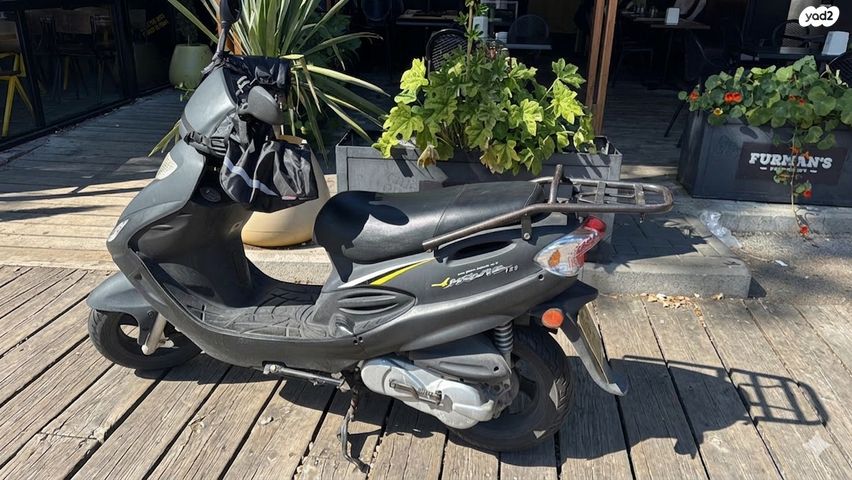 מודעת רכב קוואנג-יאנג Movie 125 XL