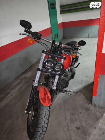 מודעת רכב הרלי דיווידסון פאט בוב 103