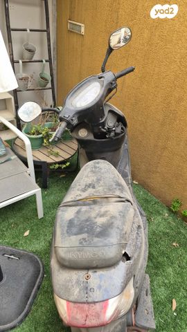 מודעת רכב קוואנג-יאנג Movie 125 XL