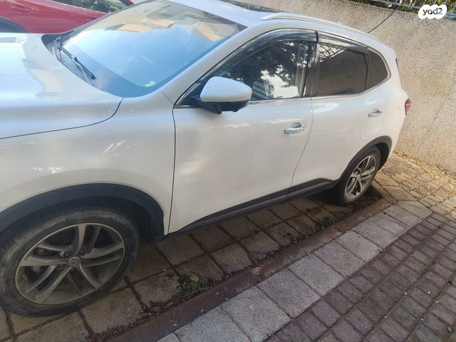 מודעת רכב אם ג'י EHS PHEV