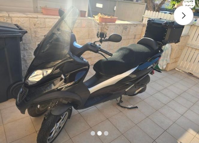 מודעת רכב פיאג'ו MP3 400