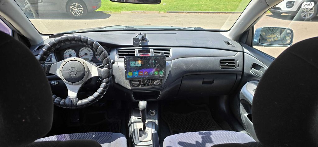 מודעת רכב מיצובישי לנסר