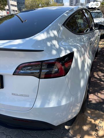 מודעת רכב טסלה מודל Y