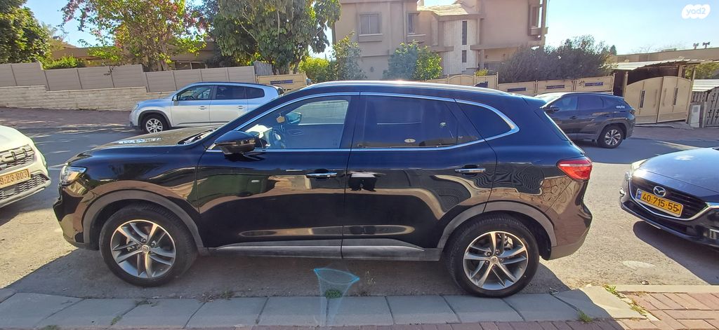 מודעת רכב אם ג'י EHS PHEV