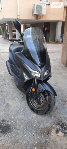 מודעת רכב קימקו איקס-טאון 125I