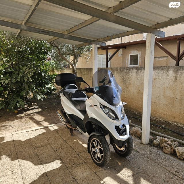 מודעת רכב פיאג'ו MP3 500