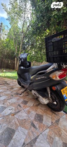 מודעת רכב קוואנג-יאנג Movie 125 XL