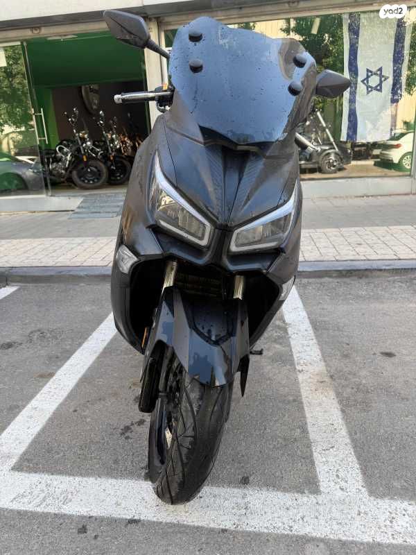 מודעת רכב סאן יאנג ג'וי-מקס Z-300