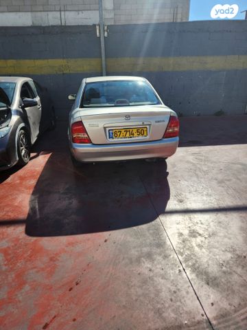 מודעת רכב מאזדה 323