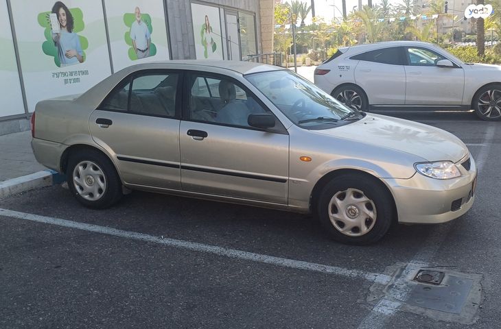 מודעת רכב מאזדה 323