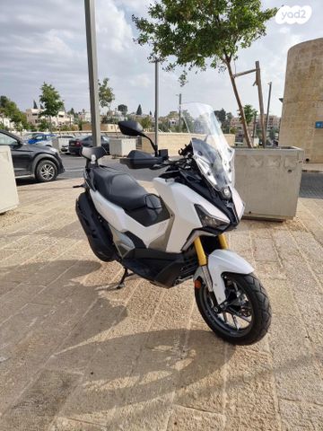 מודעת רכב סאן יאנג ADX400