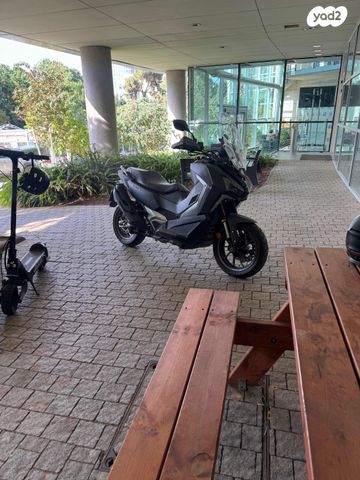 מודעת רכב סאן יאנג ADX400