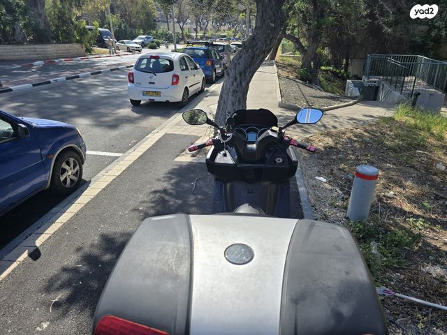 מודעת רכב קימקו דאון-טאון 300