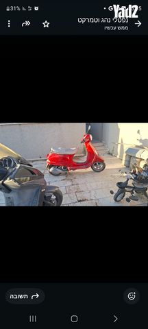 מודעת רכב פיאג'ו וספה ET4 125