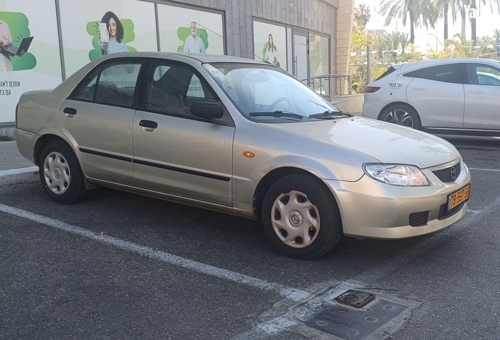 מודעת רכב מאזדה 323