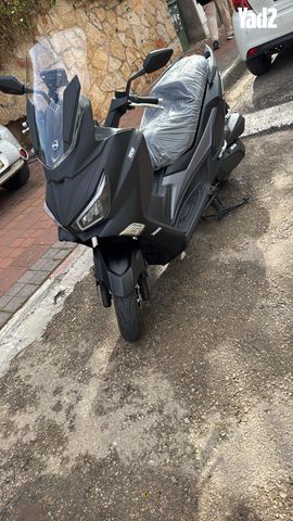 מודעת רכב סאן יאנג ג'וי-מקס Z-300