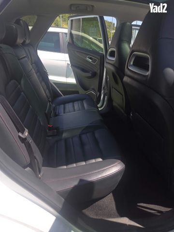 מודעת רכב אם ג'י EHS PHEV