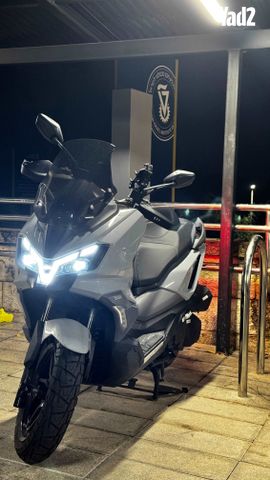 מודעת רכב סאן יאנג ADX 300