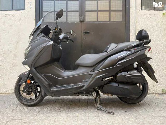 מודעת רכב סאן יאנג ג'וי-מקס Z-300
