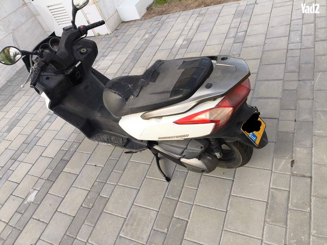 מודעת רכב קימקו דאון-טאון 300