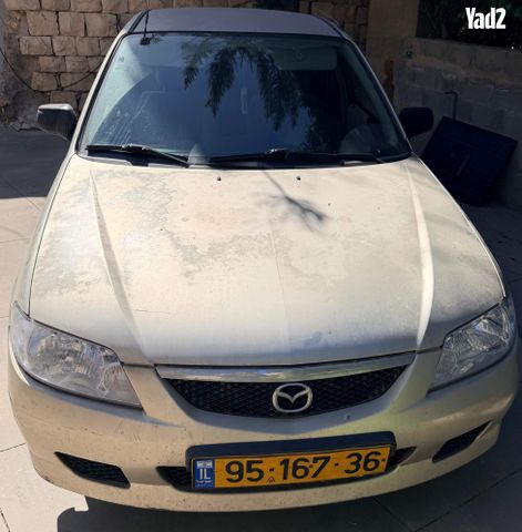 מודעת רכב מאזדה 323