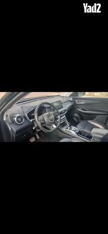 מודעת רכב אם ג'י EHS PHEV