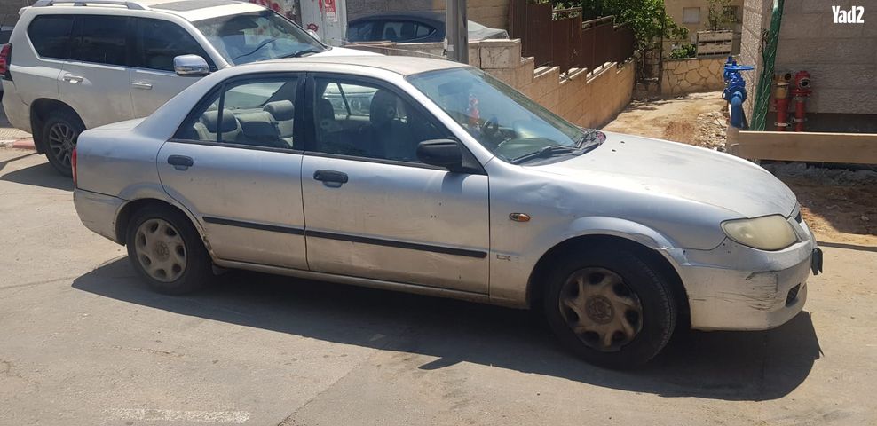 מודעת רכב מאזדה 323